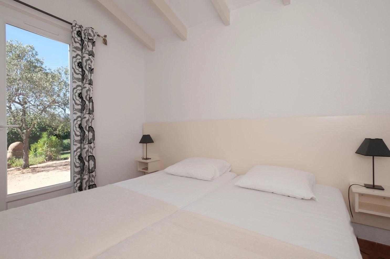 Les lits douillets de nos appartements à louer à Santa Giulia